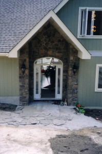 Field stone to accent a front entrance.