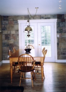 Cultured Stone Accent wall adds elegance to this casual dining room
