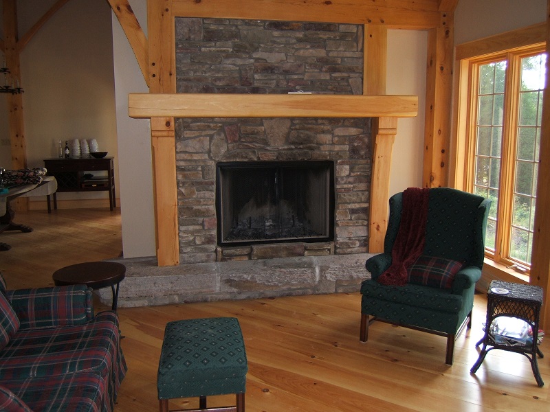 Blend of southern ledge stone with 20 percent field stone on fireplace in post and beam home in Parry Sound.