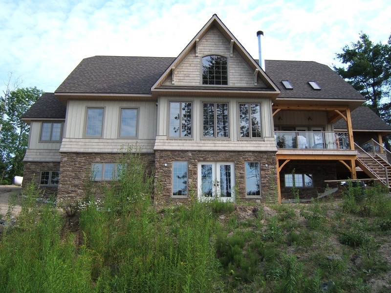 Cultured stone on foundation of lakeside