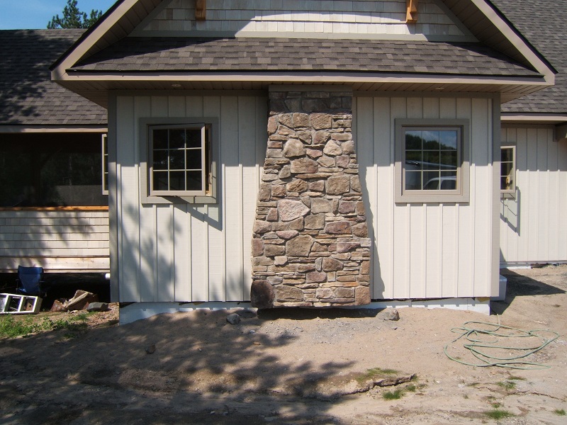 20 percent southern ledge with 80 percent field stone on faux fireplace.