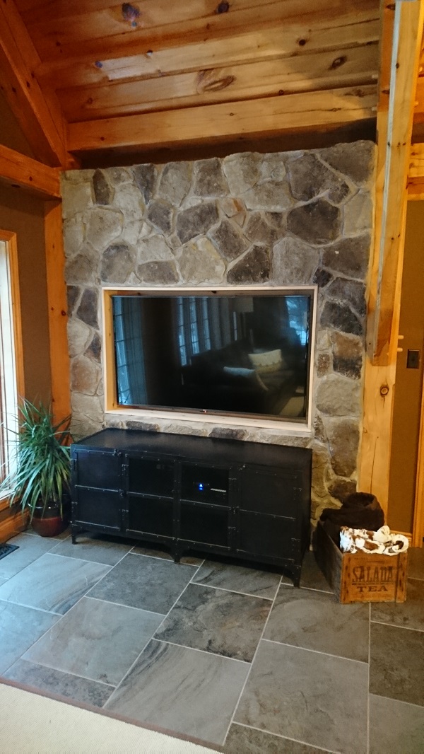 Canyon Stone veneer on accent wall with inset TV.