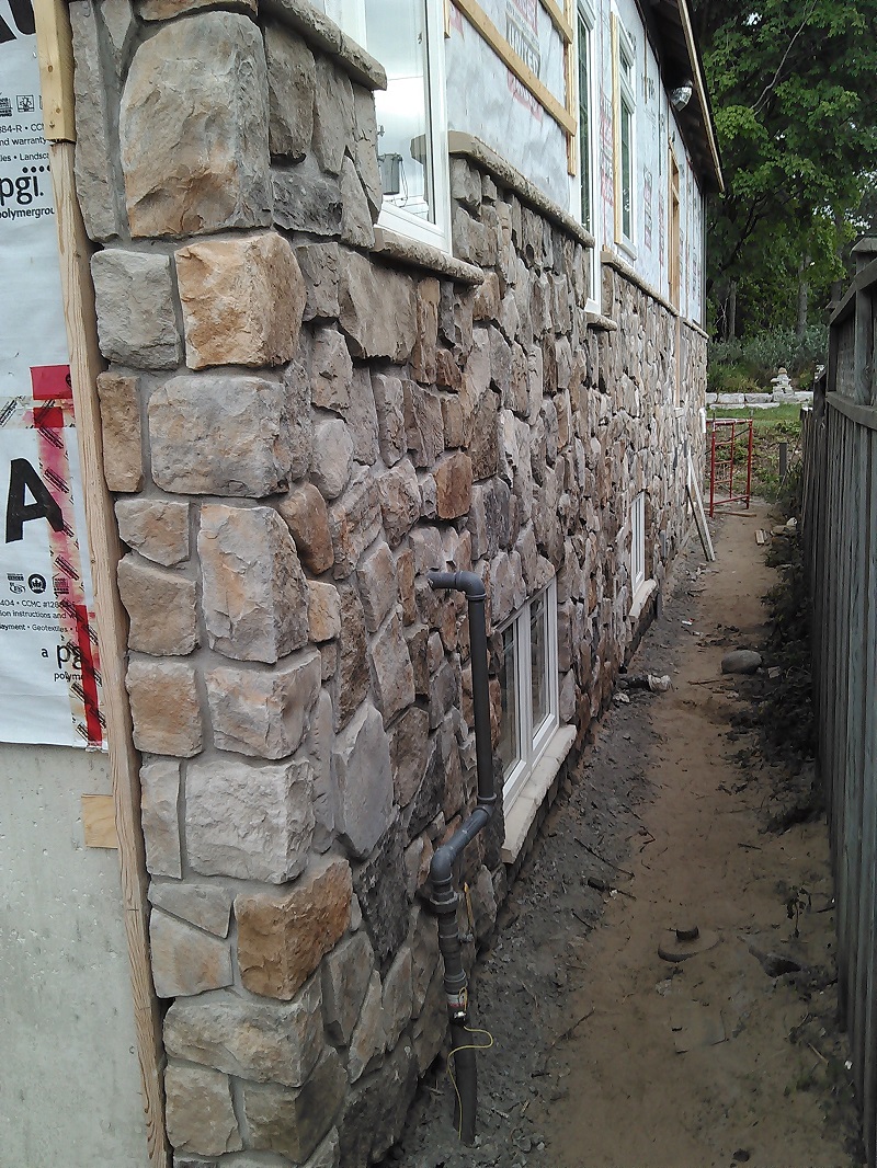 Aspen cultured stone on exterior wall of craftsman style home.