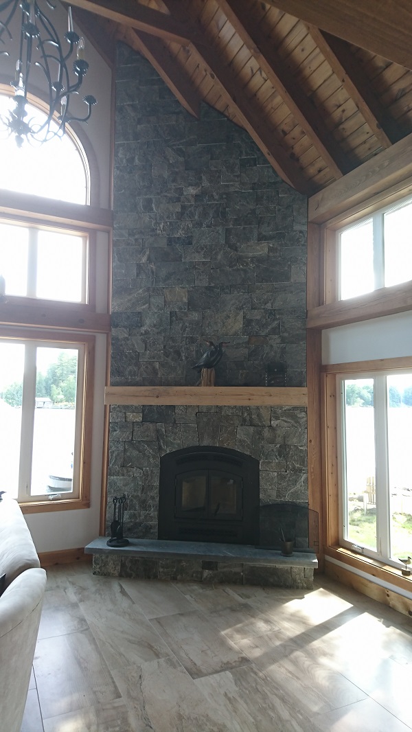 Granite veneer on corner fireplace.