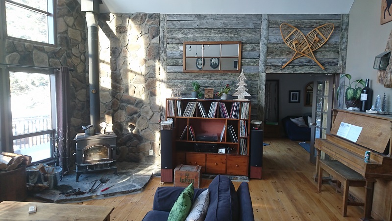 Stone veneer and barn board accent wall.