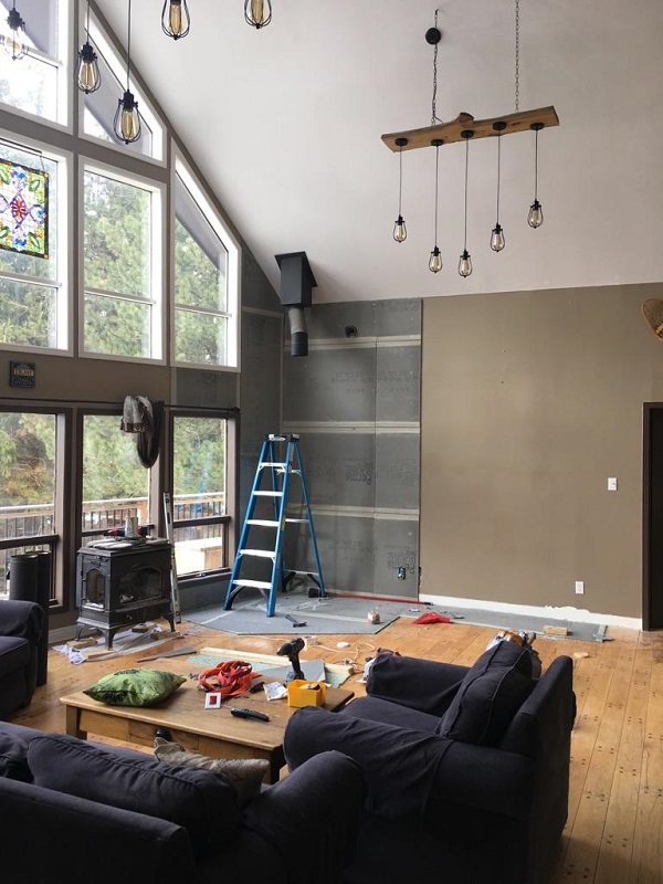 Living room wall before the addition of stone veneer.