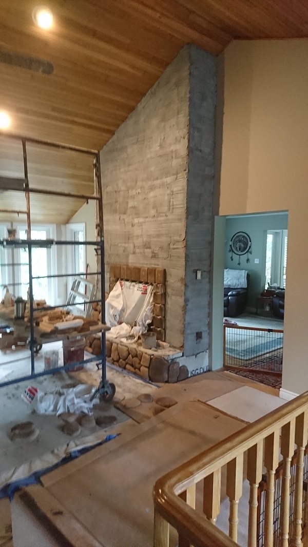 Stone veneer applied to a scratch coat. Stone veneer applied to a scratch coat.