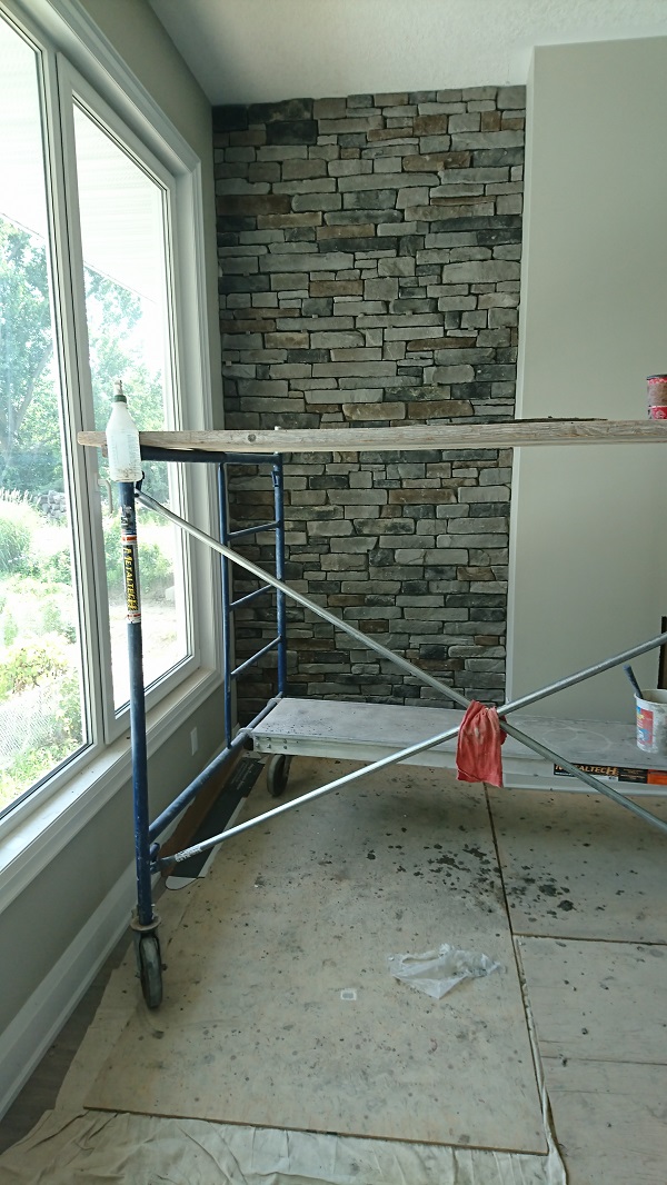 Dry stacked Pennsylvania ledge stone on accent wall.