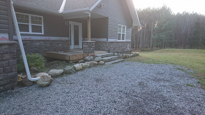 Vinyl siding removed to add cultured stone