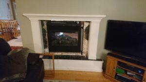 Image of TV room fireplace before stone makeover